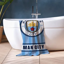 Manchester City håndklæde - 70x140 cm - 100% bomuld - Blødt badehåndklæde med Manchester City logo
